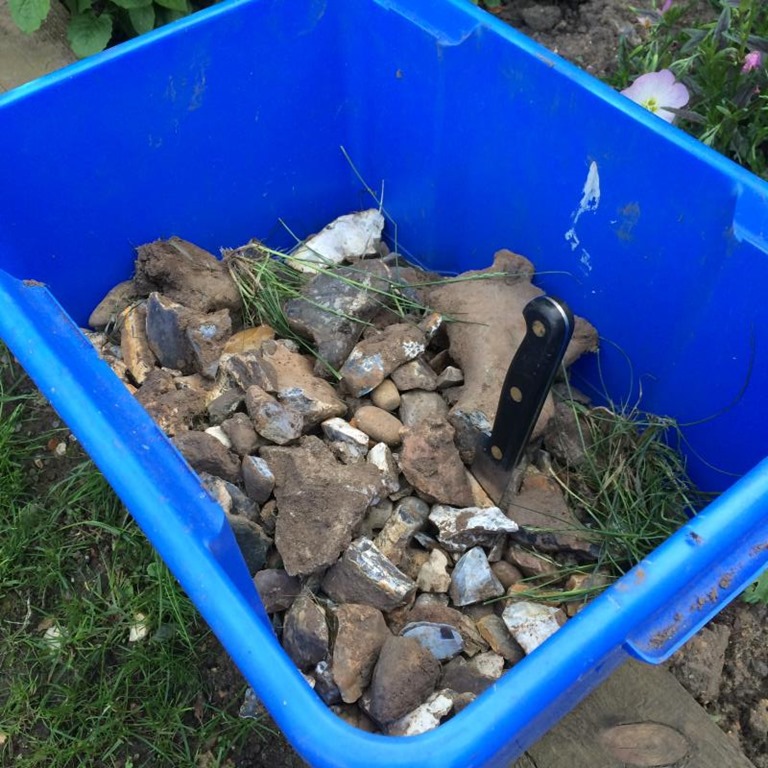 Box filled with rocks